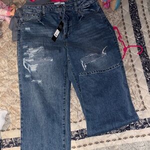 Distressed Blue Jeans
